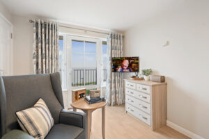 TV and radio in living area in room in Island Sands care home