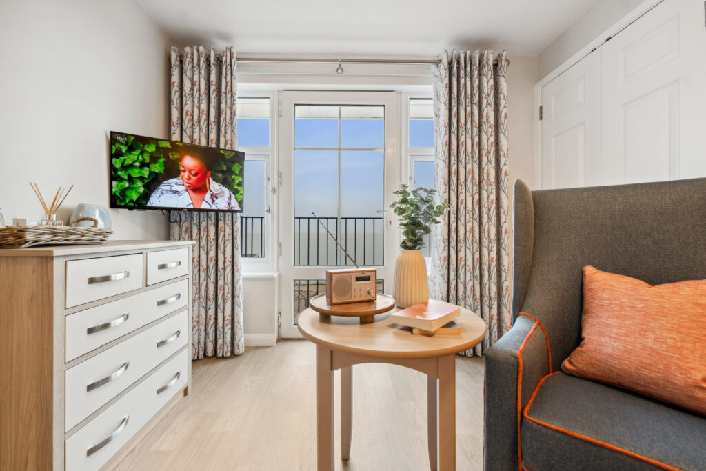 TV and radio in living area in room in Island Sands care home